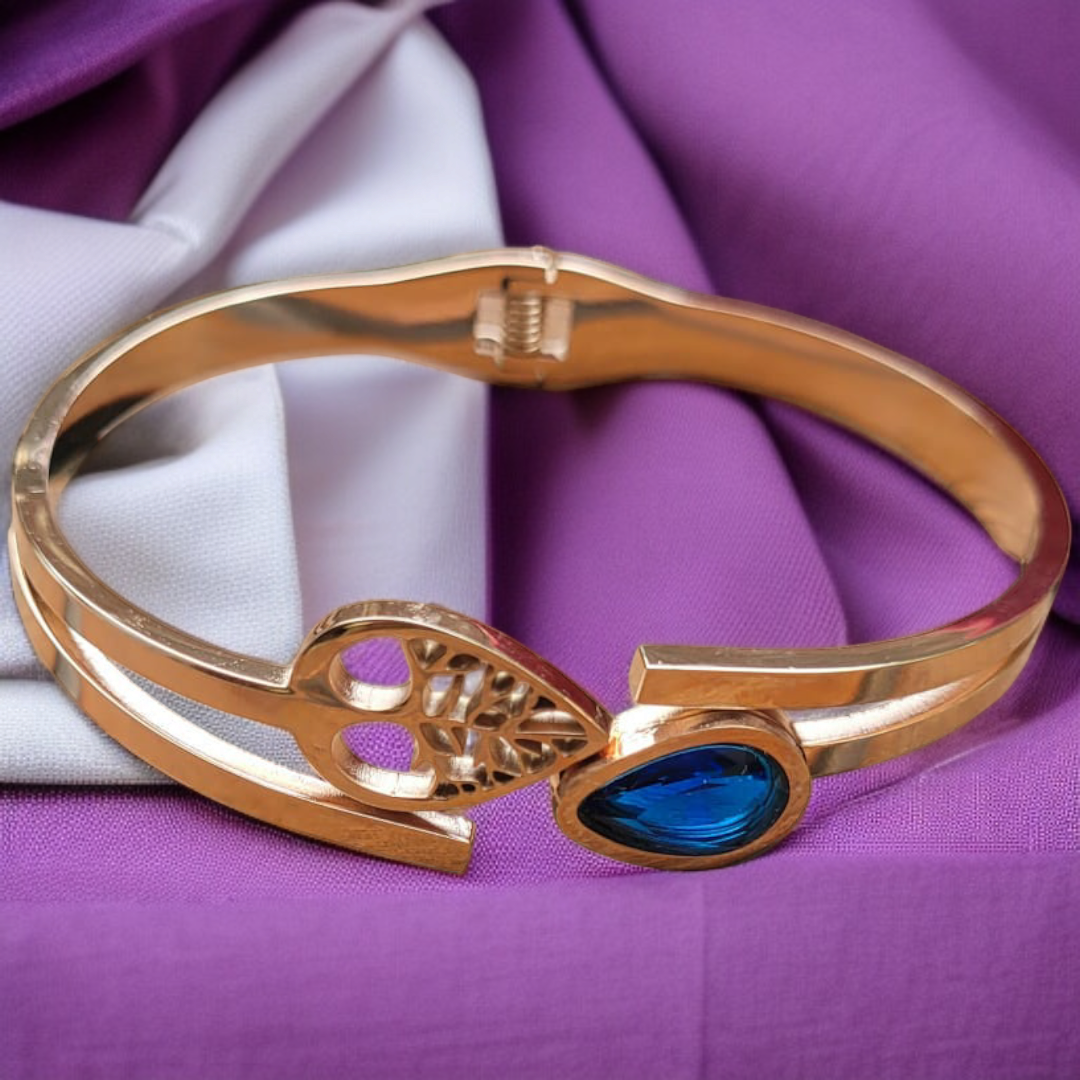 Luxury Rose Gold Bracelet with Blue Sapphire & Heart Cutout Design