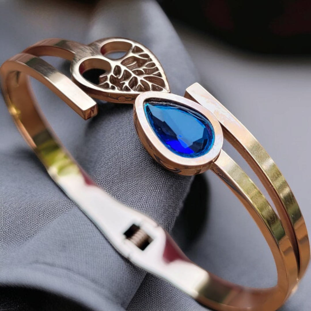 Luxury Rose Gold Bracelet with Blue Sapphire & Heart Cutout Design